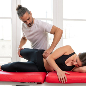 Massage du psoas : technique et bienfaits